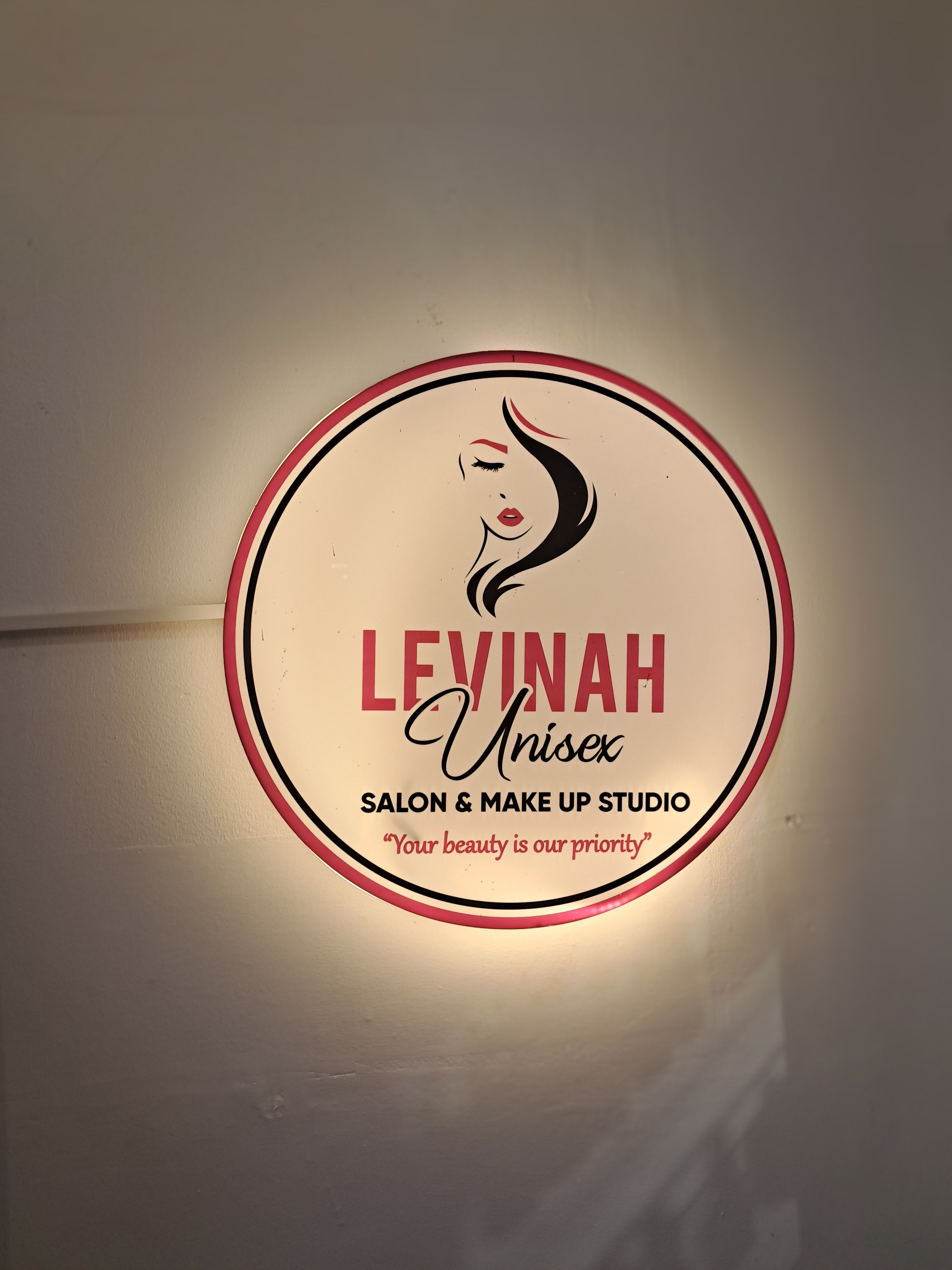Levinah illuminated wall logo
